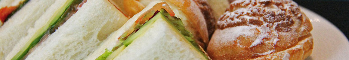 Eating Deli Sandwich at Hye Kebobs & Catering restaurant in Fresno, CA.